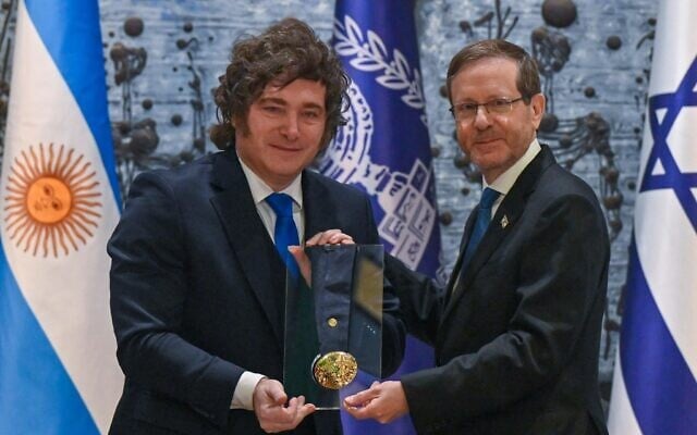 Argentinian President Javier Milei receives the Presidential Medal of Honor from President Isaac Herzog at the President's Residence in Jerusalem, April 20, 2026. (Kobi Gideon/GPO)