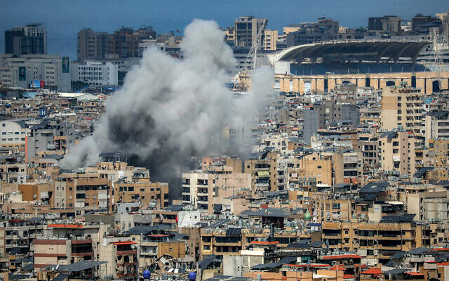 Smoke rises from the site of an Israeli strike in Beirut's southern suburbs, April 6, 2026. (Ibrahim AMRO / AFP)
