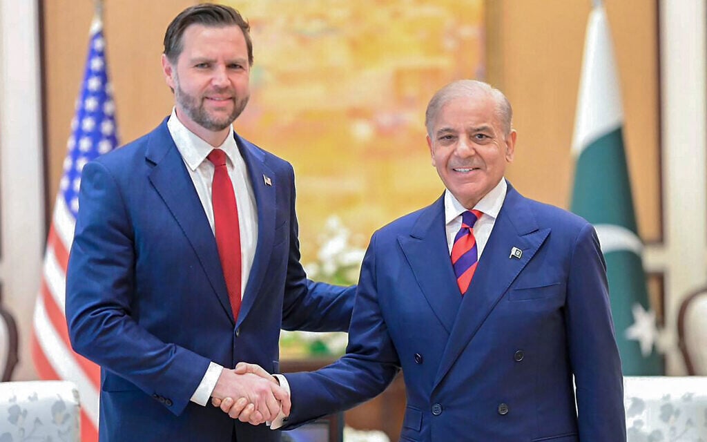 US Vice President JD Vance (L) shaking hands with Pakistan's Prime Minister Shehbaz Sharif during their meeting before US-Iran peace talks in Islamabad, on April 11, 2026. (Pakistan's Prime Minister Office / AFP)