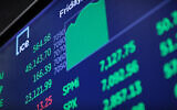 Stock market numbers are displayed on the floor of the New York Stock Exchange during morning trading on April 17, 2026 in New York City. All three major indexes surged at opening, with the Dow Jones leading the way, opening over 700 points after Iran declared the Strait of Hormuz 'completely open' after the ceasefire agreement between Lebanon and Israel. (Michael M. Santiago/Getty Images/AFP)