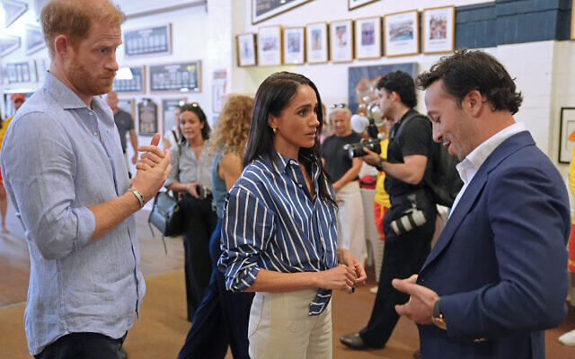 Britain's Prince Harry and his wife Meghan Markle speak with Elon Zizerb (right), Bondi beach terror attack survivor, during a meeting with volunteer first responders from Bondi Surf Bathers' Life Saving Club in Sydney on April 17, 2026. (Jonathan Brady / POOL / AFP) Britain's Prince Harry and his wife Meghan Markle speak with Elon Zizerb (right), Bondi beach terror attack survivor, during a meeting with volunteer first responders from Bondi Surf Bathers' Life Saving Club in Sydney on April 17, 2026. (Jonathan Brady / POOL / AFP)