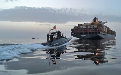 An Islamic Revolutionary Guard Corps (IRGC) boat allegedly takes part in an operation to seize ships attempting to cross the Strait of Hormuz, on April 21, 2026. (MIRZADEH via the Iranian news agency TASNIM NEWS, via AFP)