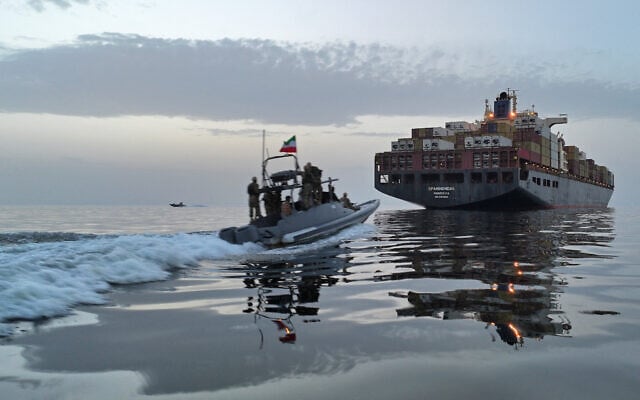 An Islamic Revolutionary Guard Corps (IRGC) boat allegedly takes part in an operation to seize ships attempting to cross the Strait of Hormuz, on April 21, 2026. (MIRZADEH via the Iranian news agency TASNIM NEWS, via AFP)