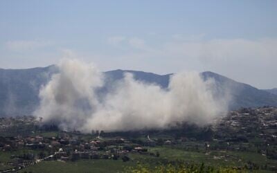 Smoke billows from explosions in the southern Lebanese village of Khiam on April 25, 2026 (AFP)