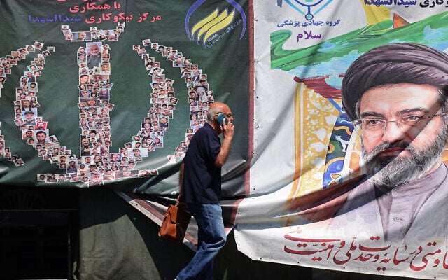 A man walks past a banner installed along the roadside of Iran's supreme leader Ayatollah Mojtaba Khamenei, in Tehran on April 29, 2026. (ATTA KENARE / AFP) A man walks past a banner installed along the roadside of Iran's supreme leader Ayatollah Mojtaba Khamenei, in Tehran on April 29, 2026. (ATTA KENARE / AFP)