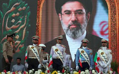 Iranian army soldiers stand in front of a picture of Iran's Supreme Leader Ayatollah Mojtaba Khamenei during a pro-regime rally in Tehran, Iran, on April 29, 2026. (AFP)