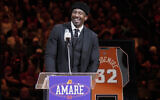 Former Phoenix Suns player Amare Stoudemire addresses the crowd during his Ring of Honor ceremony at halftime of an NBA basketball game in Phoenix, March 2, 2024. (AP/Darryl Webb)