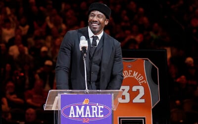 Former Phoenix Suns player Amare Stoudemire addresses the crowd during his Ring of Honor ceremony at halftime of an NBA basketball game in Phoenix, March 2, 2024. (AP/Darryl Webb)