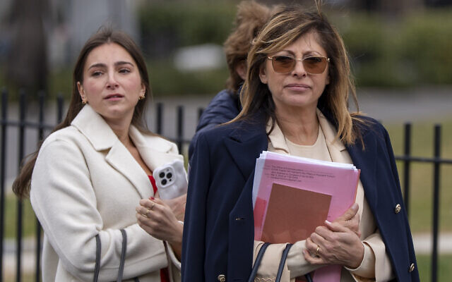 FOX Business Network anchor Maria Bartiromo, right, arrives at the White House, March 6, 2025, in Washington. (AP Photo/Alex Brandon)