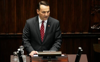 Poland's Foreign Minister Radek Sikorski gives a speech at the parliament, in Warsaw, Poland, April 23, 2025. (Czarek Sokolowski/AP)