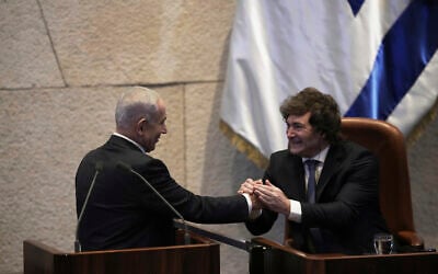 Israel's Prime Minister Benjamin Netanyahu, left, greets Argentina's President Javier Milei in the Knesset, Israel's parliament, in Jerusalem, June 11, 2025. (AP Photo/Ohad Zwigenberg) Israel's Prime Minister Benjamin Netanyahu, left, greets Argentina's President Javier Milei in the Knesset, Israel's parliament, in Jerusalem, June 11, 2025. (AP Photo/Ohad Zwigenberg)