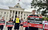 Abraham Bonowitz, executive director of Death Penalty Action, and other death penalty opponents hold a demonstration outside the Alabama Capitol in Montgomery, Alabama, September 25, 2024, asking the state to call off the scheduled execution of Alan Miller in what would be the nation's second execution using nitrogen gas. (AP Photo/Kim Chandler, File)