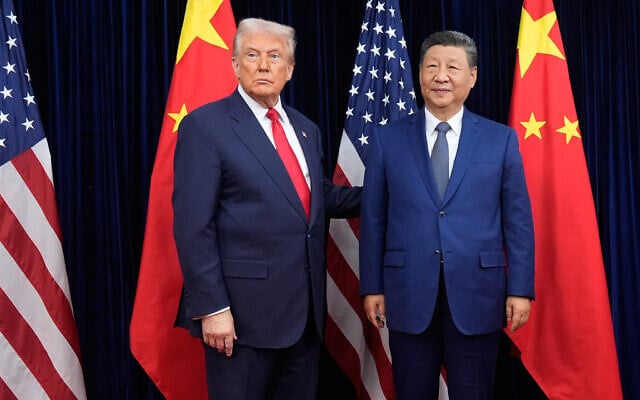 US President Donald Trump, left, and Chinese President Xi Jinping pose ahead of their summit talk at Gimhae International Airport in Busan, South Korea, October 30, 2025. (AP Photo/Mark Schiefelbein) US President Donald Trump, left, and Chinese President Xi Jinping pose ahead of their summit talk at Gimhae International Airport in Busan, South Korea, October 30, 2025. (AP Photo/Mark Schiefelbein)