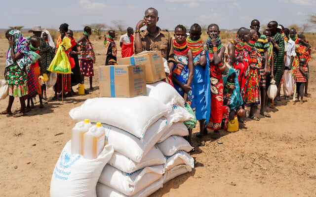 Locals queue to receive food aid as severe drought continues, in Nalemkais Village, Turkana County, Kenya, Feb. 8, 2026. (AP/Patrick Ngugi) Locals queue to receive food aid as severe drought continues, in Nalemkais Village, Turkana County, Kenya, Feb. 8, 2026. (AP/Patrick Ngugi)