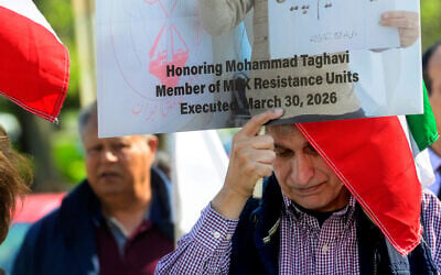 Glenn Torshizi, whose brothers were executed by the Iranian government, joins others in a picket line at the US State Department to highlight the executions in Karaj, Iran, of People's Mojahedin Organization of Iran members, March 30, 2026, in Washington. (AP Photo/ Rod Lamkey, Jr.)