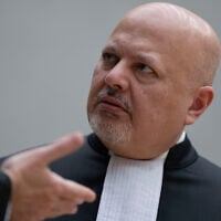 ICC Chief Prosecutor Karim Khan talks before convening the International Criminal Court in The Hague, Netherlands, March 14, 2025. (AP Photo/Peter Dejong, Pool)