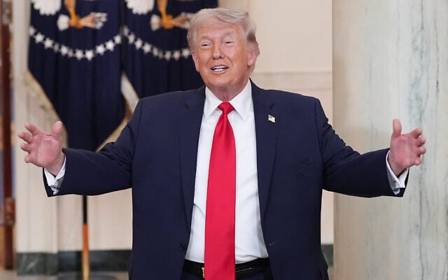 US President Donald Trump gestures after speaking about the Iran war from the Cross Hall of the White House in Washington, April 1, 2026. (AP Photo/ Alex Brandon, Pool)