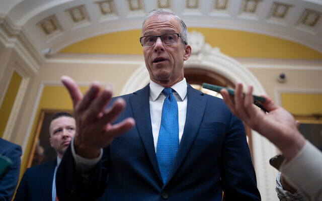 US Senate Majority Leader John Thune, a Republican from South Dakota, speaks to reporters outside the chamber, at the Capitol in Washington, April 2, 2026. (AP Photo/J. Scott Applewhite)
