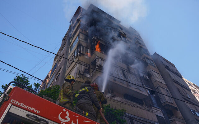 Firefighters spray water on a burning residential building following an Israeli airstrike in central Beirut, Lebanon, March 18, 2026. (AP Photo/Bilal Hussein, File) Firefighters spray water on a burning residential building following an Israeli airstrike in central Beirut, Lebanon, March 18, 2026. (AP Photo/Bilal Hussein, File)