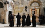 Catholic clergymen attend a Good Friday procession along the Via Dolorosa in Jerusalem's Old City, April 3, 2026. (AP Photo/Mahmoud Illean)