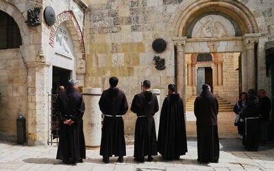 Catholic clergymen attend a Good Friday procession along the Via Dolorosa in Jerusalem's Old City, April 3, 2026. (AP Photo/Mahmoud Illean)