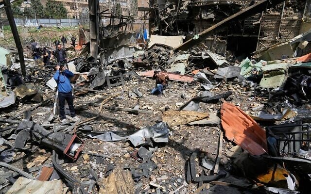 Photographers document damage from US-Israeli airstrikes Friday at Shahid Beheshti University in Tehran, Iran, Saturday, April 4, 2026. (AP Photo/Vahid Salemi)