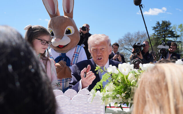 President Donald Trump sits down with children as he participates in the White House Easter Egg Roll on the South Lawn of the White House, April 6, 2026, in Washington. (AP/Alex Brandon)