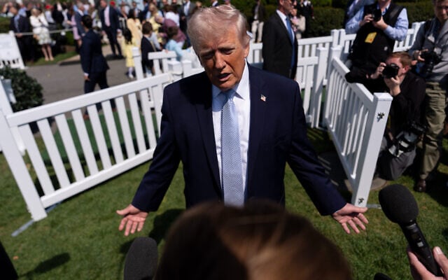 US President Donald Trump speaks with reporters during the White House Easter Egg Roll on the South Lawn of the White House, April 6, 2026, in Washington. (AP Photo/Julia Demaree Nikhinson)