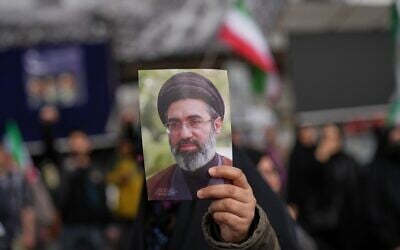A demonstrator holds a picture of Iran's Supreme Leader Mojtaba Khamenei in Tehran, Iran, April 8, 2026. (AP Photo/Francisco Seco) A demonstrator holds a picture of Iran's Supreme Leader Mojtaba Khamenei in Tehran, Iran, April 8, 2026. (AP Photo/Francisco Seco)
