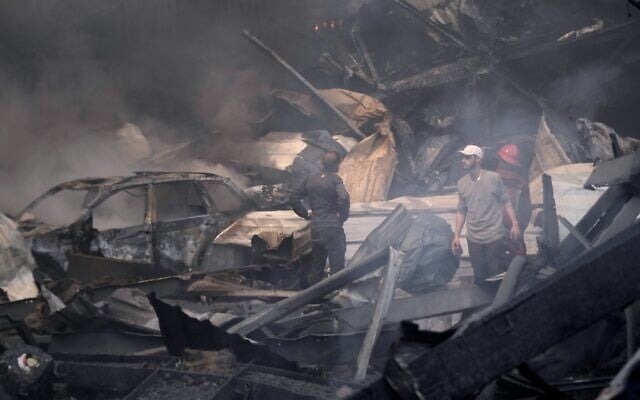 First responders stand beside wreckage at the site of an Israeli airstrike that struck an apartment building in Beirut, Lebanon, April 8, 2026. (AP Photo/Bilal Hussein) First responders stand beside wreckage at the site of an Israeli airstrike that struck an apartment building in Beirut, Lebanon, April 8, 2026. (AP Photo/Bilal Hussein)