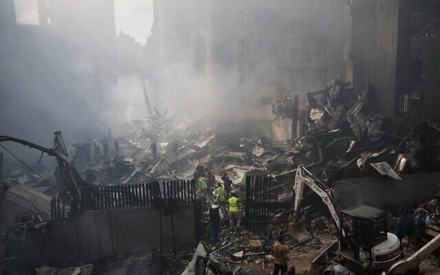 Firefighters and residents gather at the site of an Israeli airstrike in Beirut, Lebanon, April 8, 2026. (AP Photo/Hussein Malla) Firefighters and residents gather at the site of an Israeli airstrike in Beirut, Lebanon, April 8, 2026. (AP Photo/Hussein Malla)