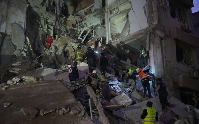 Rescuers search for victims in a destroyed building that was hit in an Israeli airstrike in central Beirut, Lebanon, April 8, 2026. (AP Photo/Emilio Morenatti) Rescuers search for victims in a destroyed building that was hit in an Israeli airstrike in central Beirut, Lebanon, April 8, 2026. (AP Photo/Emilio Morenatti)