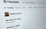 The Polymarket prediction market website is displayed on a computer screen, January 11, 2026, in New York. (AP/Wyatte Grantham-Philips)