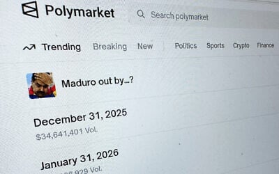 The Polymarket prediction market website is displayed on a computer screen, January 11, 2026, in New York. (AP/Wyatte Grantham-Philips)