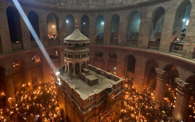 Orthodox Christian pilgrims hold up candles during the Holy Fire ceremony at the Church of the Holy Sepulchre, in the Old City of Jerusalem, April 11, 2026. (AP Photo/Ohad Zwigenberg) Orthodox Christian pilgrims hold up candles during the Holy Fire ceremony at the Church of the Holy Sepulchre, in the Old City of Jerusalem, April 11, 2026. (AP Photo/Ohad Zwigenberg)