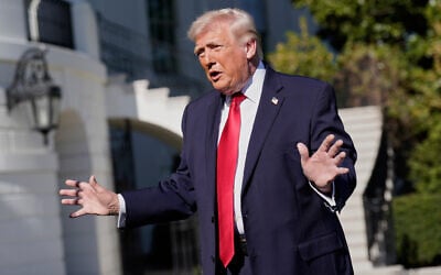 US President Donald Trump talks to the media on the South Lawn before departing on Marine One at the White House, April 11, 2026, in Washington. (AP/Jose Luis Magana)