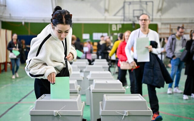 A woman casts her vote a polling station during the Hungarian parliamentary election in Budapest, Hungary, April 12, 2026. (AP Photo/ Denes Erdos) A woman casts her vote a polling station during the Hungarian parliamentary election in Budapest, Hungary, April 12, 2026. (AP Photo/ Denes Erdos)