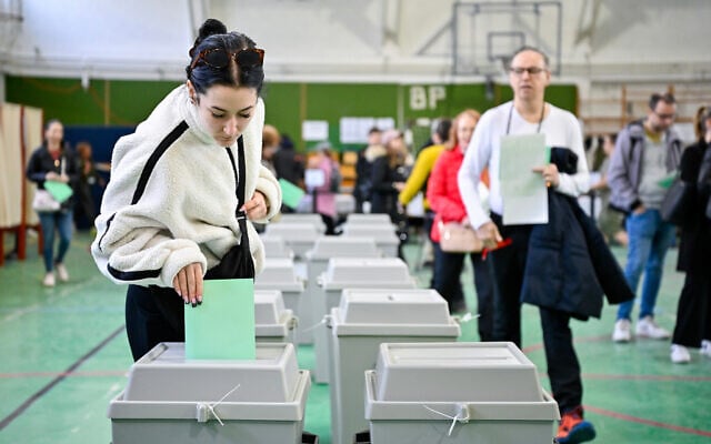 A woman casts her vote a polling station during the Hungarian parliamentary election in Budapest, Hungary, April 12, 2026. (AP Photo/Denes Erdos) A woman casts her vote a polling station during the Hungarian parliamentary election in Budapest, Hungary, April 12, 2026. (AP Photo/Denes Erdos)