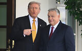 US President Donald Trump, left, greets Hungary's Prime Minister Viktor Orban at the White House, Nov. 7, 2025, in Washington. (AP Photo/John McDonnell, File)