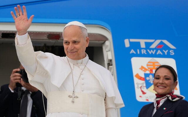 Pope Leo XIV waves before boarding a flight to Algiers at Rome's Leonardo da Vinci-Fiumicino International Airport, Monday, April 13, 2026, marking the start of an 11-day apostolic journey to Africa. (AP Photo/Gregorio Borgia) Pope Leo XIV waves before boarding a flight to Algiers at Rome's Leonardo da Vinci-Fiumicino International Airport, Monday, April 13, 2026, marking the start of an 11-day apostolic journey to Africa. (AP Photo/Gregorio Borgia)
