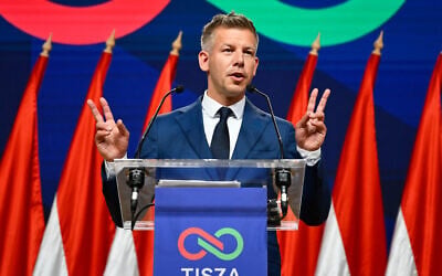Peter Magyar gestures as he speaks to the media in Budapest, Hungary, on April 13, 2026, after defeating Prime Minister Viktor Orban's party in the country's parliamentary elections. (AP Photo/Denes Erdos)