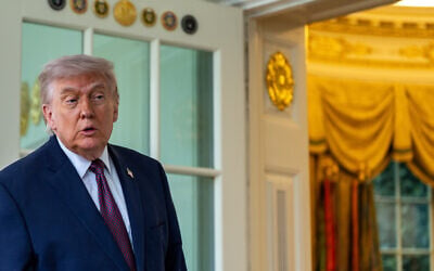 US President Donald Trump speaks with reporters outside the Oval Office of the White House, April 13, 2026, in Washington. (AP Photo/Alex Brandon)
