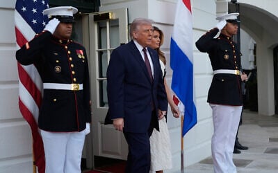 US President Donald Trump and first lady Melania Trump walk from the White House to greet King Willem-Alexander and Queen Máxima of the Netherlands, April 13, 2026, in Washington. (AP/Manuel Balce Ceneta)