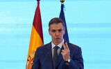 Spain's Prime Minister Pedro Sanchez gestures as he speaks during a press conference in Beijing, China, April 14, 2026. (AP/Ng Han Guan)