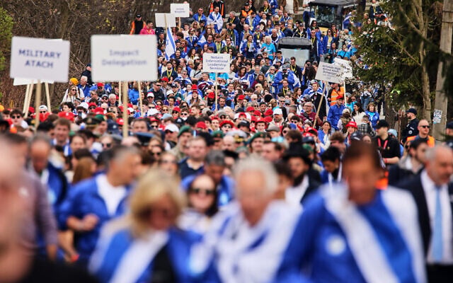 People take part in the annual "March of the Living" between the former Nazi death camps of Auschwitz and Birkenau to commemorate the Holocaust, in Oswiecim, Poland, April 14, 2026. (AP Photo/Beata Zawrzel) People take part in the annual "March of the Living" between the former Nazi death camps of Auschwitz and Birkenau to commemorate the Holocaust, in Oswiecim, Poland, April 14, 2026. (AP Photo/Beata Zawrzel)