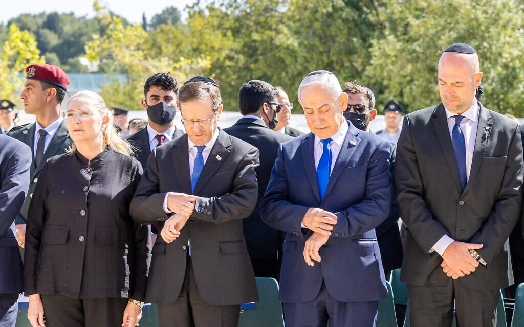 Israeli Prime Minister Benjamin Netanyahu, second right, and Israel's President Isaac Herzog, second left, attend a ceremony marking the annual Holocaust Remembrance Day at the Yad Vashem Holocaust Memorial in Jerusalem Tuesday, April 14, 2026. (Oren Ben Hakoon/Israel Hayom via AP, Pool) Israeli Prime Minister Benjamin Netanyahu, second right, and Israel's President Isaac Herzog, second left, attend a ceremony marking the annual Holocaust Remembrance Day at the Yad Vashem Holocaust Memorial in Jerusalem Tuesday, April 14, 2026. (Oren Ben Hakoon/Israel Hayom via AP, Pool)
