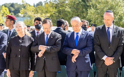 Israeli Prime Minister Benjamin Netanyahu, second right, and Israel's President Isaac Herzog, second left, attend a ceremony marking the annual Holocaust Remembrance Day at the Yad Vashem Holocaust Memorial in Jerusalem Tuesday, April 14, 2026. (Oren Ben Hakoon/Israel Hayom via AP, Pool) Israeli Prime Minister Benjamin Netanyahu, second right, and Israel's President Isaac Herzog, second left, attend a ceremony marking the annual Holocaust Remembrance Day at the Yad Vashem Holocaust Memorial in Jerusalem Tuesday, April 14, 2026. (Oren Ben Hakoon/Israel Hayom via AP, Pool)