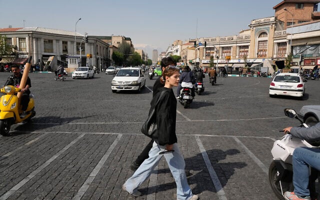 Pedestrians and vehicles cross an intersection in downtown Tehran, Iran, April 16, 2026. (AP Photo/Vahid Salemi) Pedestrians and vehicles cross an intersection in downtown Tehran, Iran, April 16, 2026. (AP Photo/Vahid Salemi)