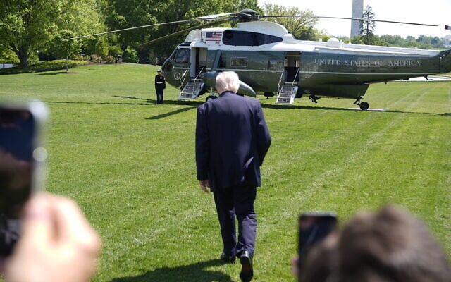 US President Donald Trump walks on the South Lawn to board Marine One as he departs the White House, Thursday, April 16, 2026, in Washington. (AP Photo/Manuel Balce Ceneta)