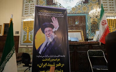 A banner shows a portrait of the slain Iranian supreme leader Ayatollah Ali Khamenei during a memorial for him and others who were killed in the US and Israel strikes, at Yousefabad Synagogue, in Tehran, Iran, on April 16, 2026. (AP Photo/Vahid Salemi)